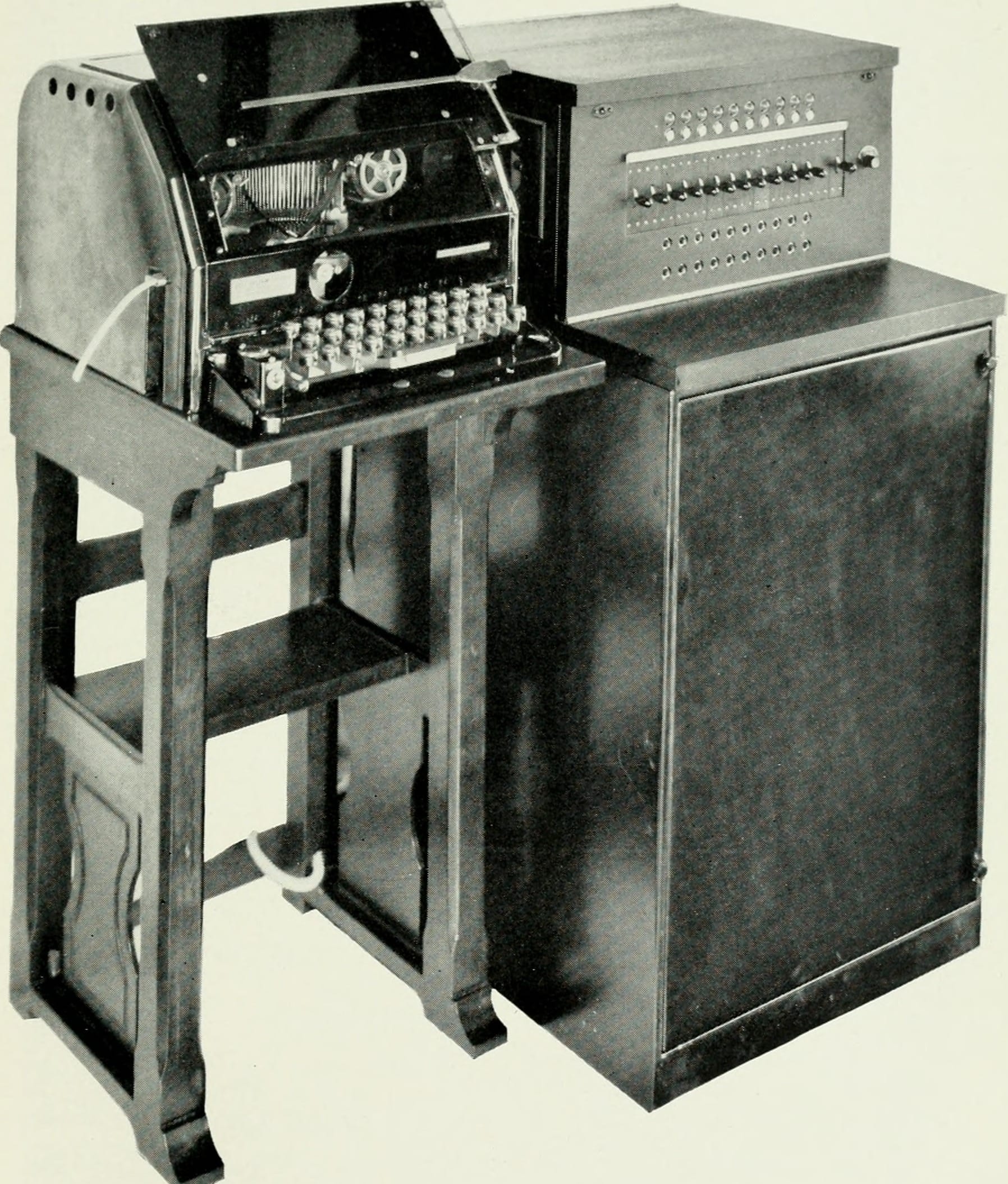 A "telephone typewriter" — an early teleprinter on a wooden stand — photographed for Bell Telephone Magazine in 1922