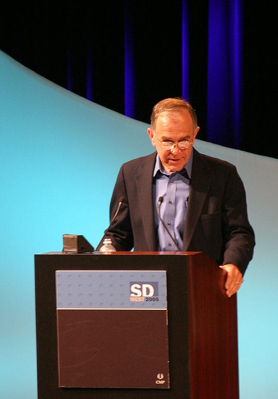 Stephen Bourne speaking at a podium at SD West 2005